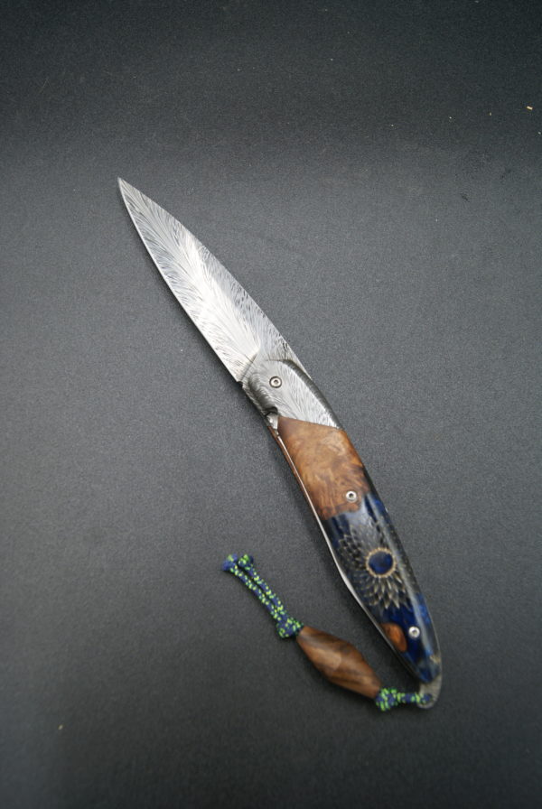 Pliant liner lock damas plume Amboine et résine