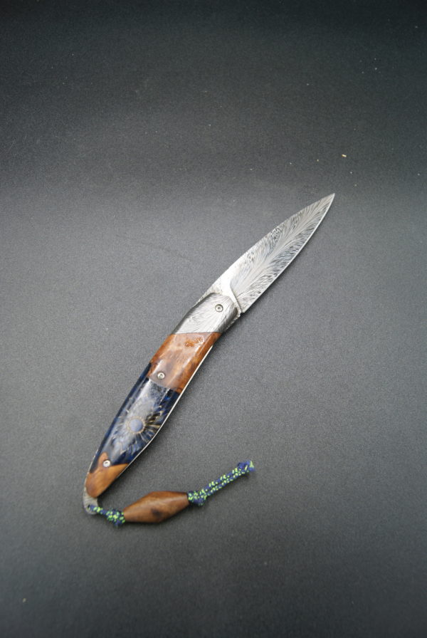 Pliant liner lock damas plume Amboine et résine