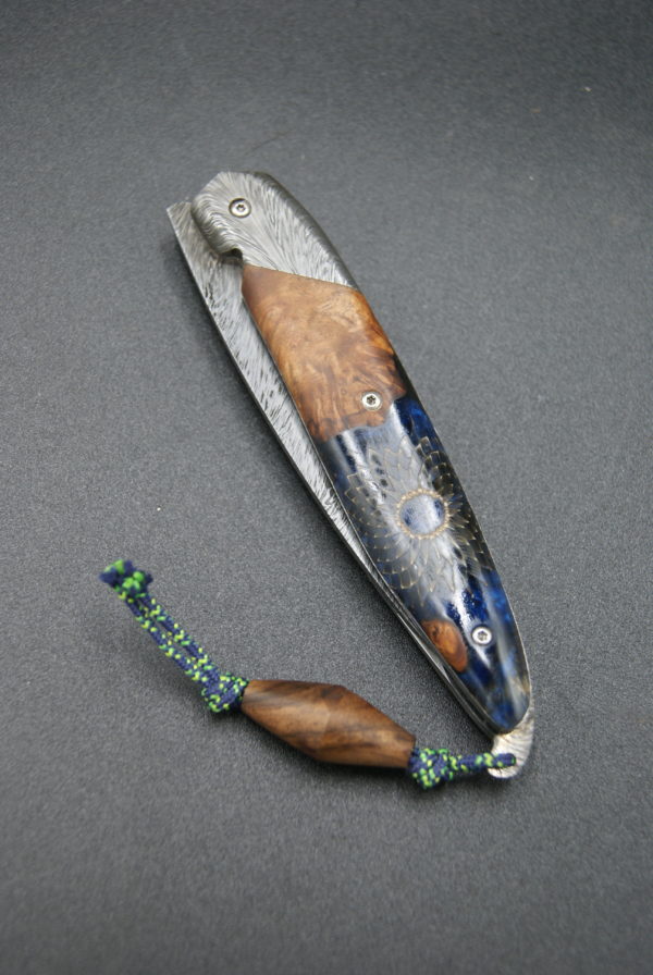 Pliant liner lock damas plume Amboine et résine