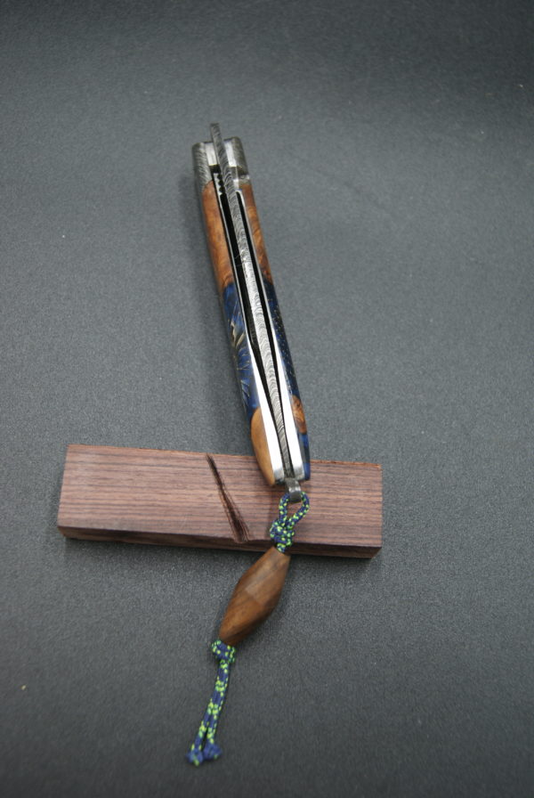 Pliant liner lock damas plume Amboine et résine